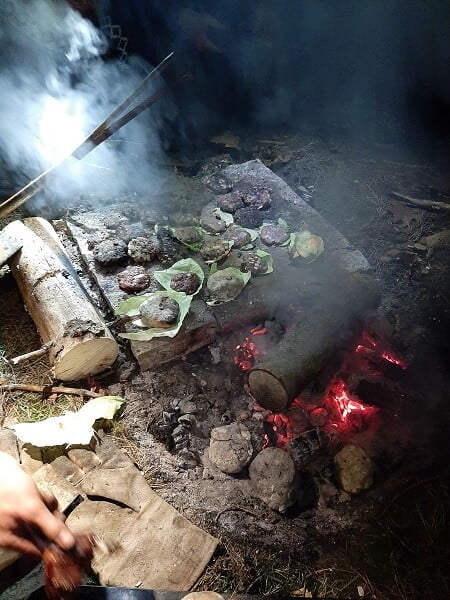 Grilling on a hot stone or in the ashes